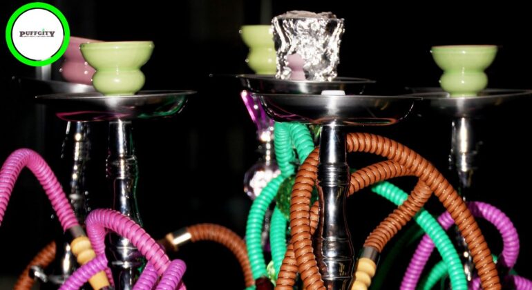 This picture shows hookah water pipes in various colors.