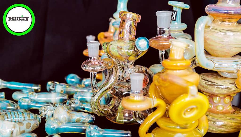 This picture shows different types of bongs which are yellow and sky blue in color.